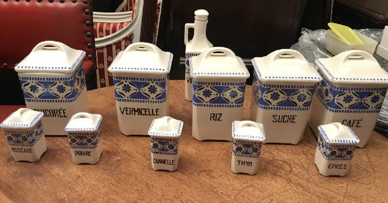 Set of French blue and white porcelain kitchen spice containers.