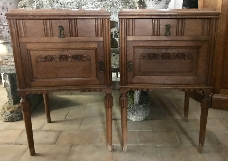 Pair of French art deco walnut & floral carved bedside cabinets with inset marble tops.