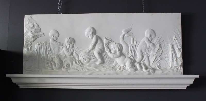 Interesting mid-20th century plaster cupid wall panel with lightning trough.