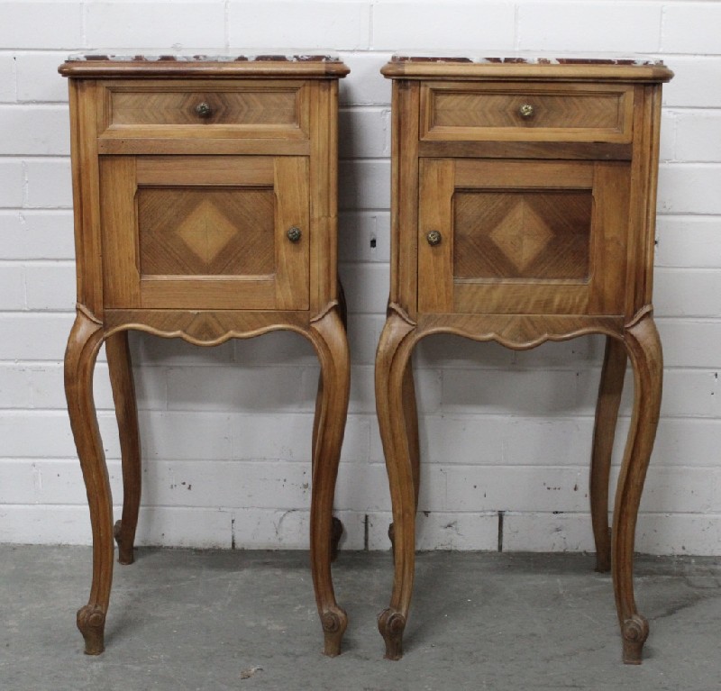 Pair of French Louis XVth walnut bedside cabinets with inset rouge marble tops.