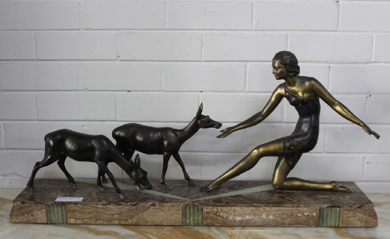 Large French art deco spelter maiden and 2 deer statue on marble and onyx base.