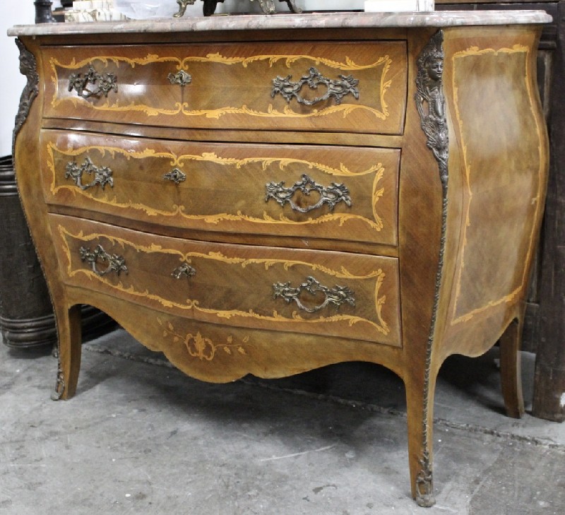 French Louis XVth walnut & inlaid three drawer commode having marble top and ormolu mounts.
