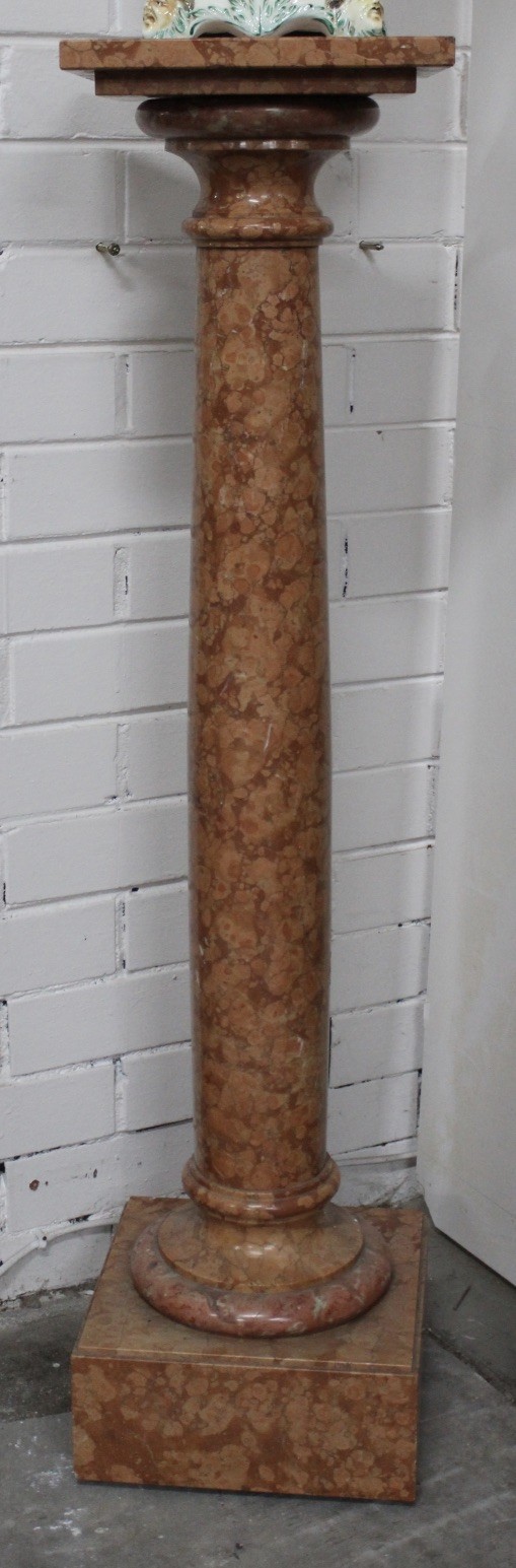 French late 19th century rouge marble column pedestal.