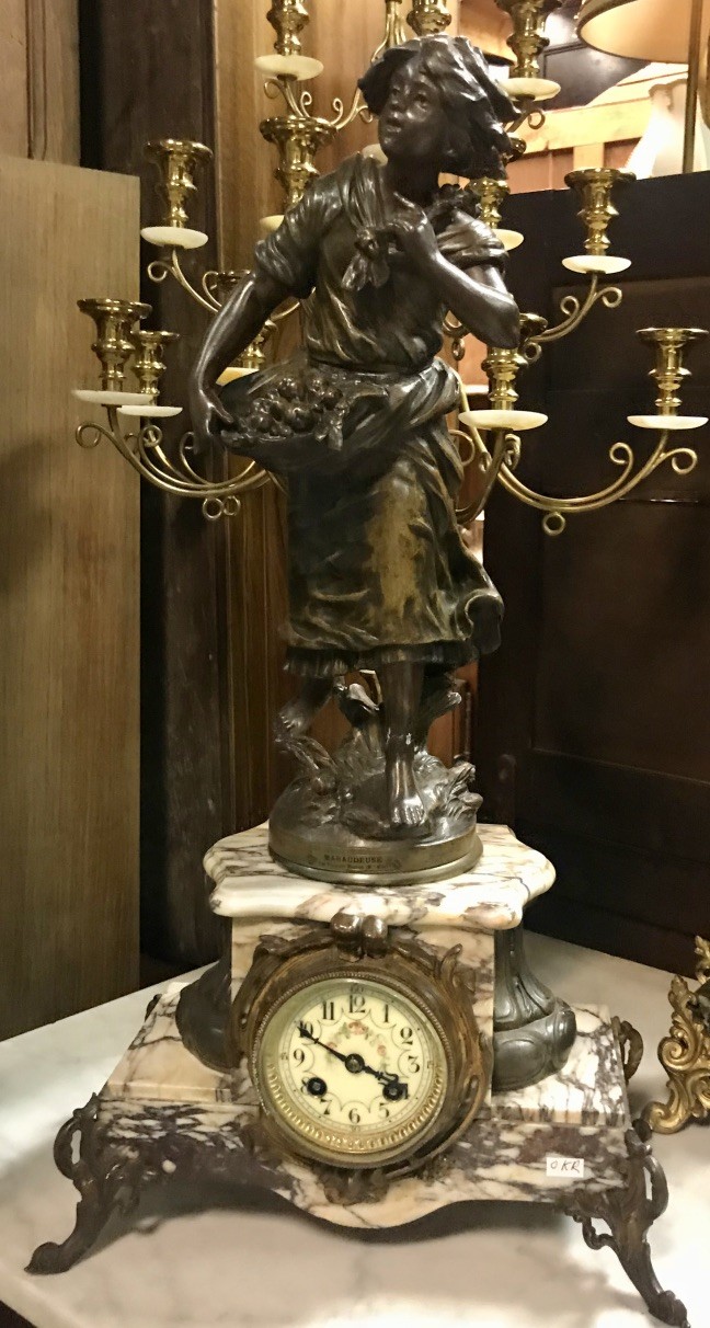 French late 19th century maiden figured mantle clock with marble base.