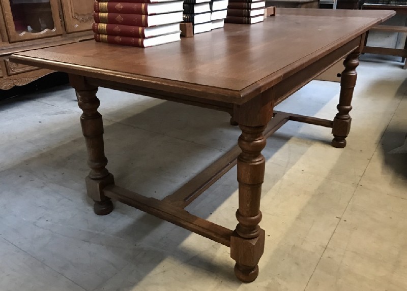French oak stretcher based refectory table with two extra leaves.