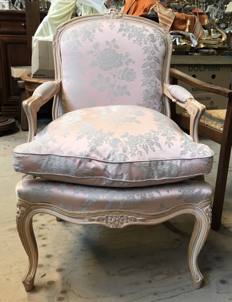French Louis XVth lacquered and floral upholstered fauteuil.