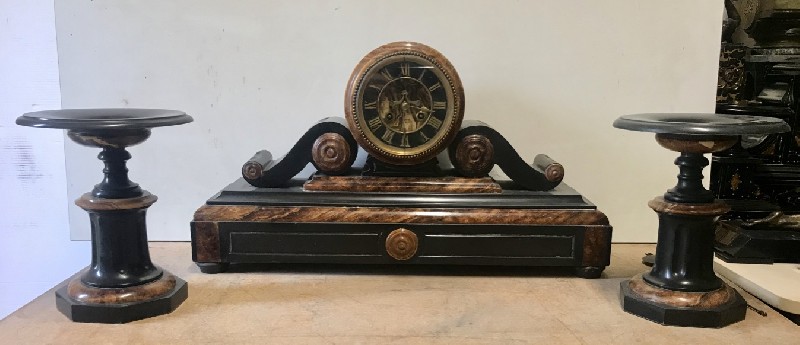 Three piece French black & brown marble clock garniture set.