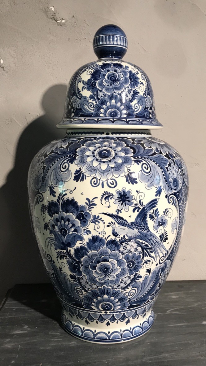 Delft blue and white floral porcelain vase and cover.