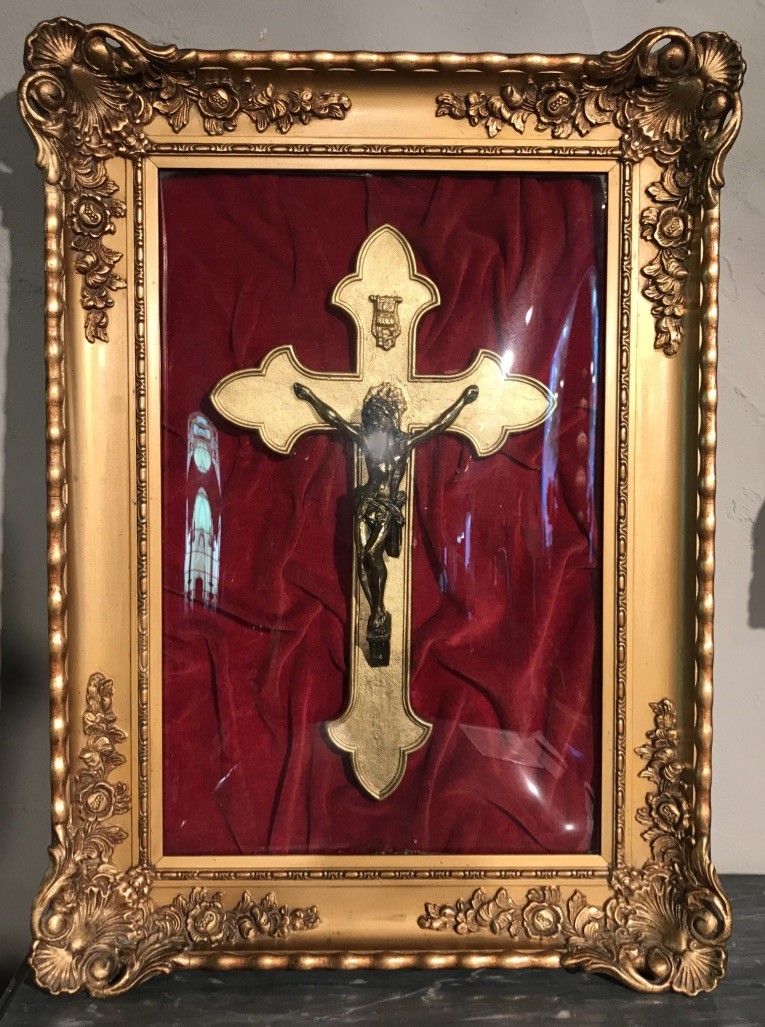 French brass crucifix in ornate convex glass gilt frame