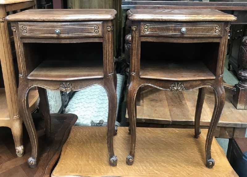 Pair of French provincial oak one drawer bedside cabinets.
