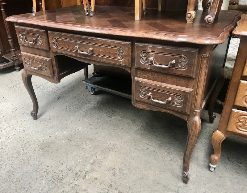 French provincial oak 5 drawer bureau with parquetry top.