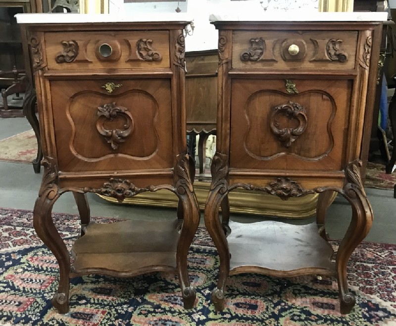 Pair of 19th century French Louis XVth walnut and white marble top bedside cabinets.