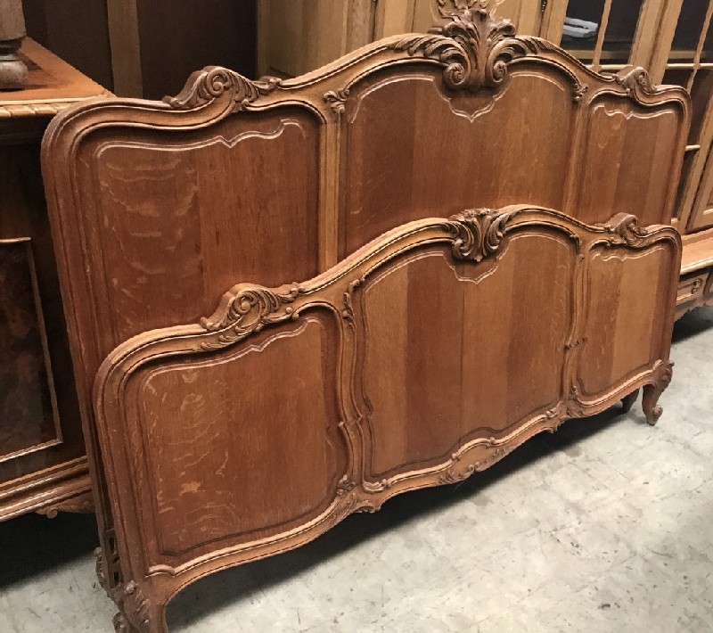 Large queen size French provincial oak bedstead.