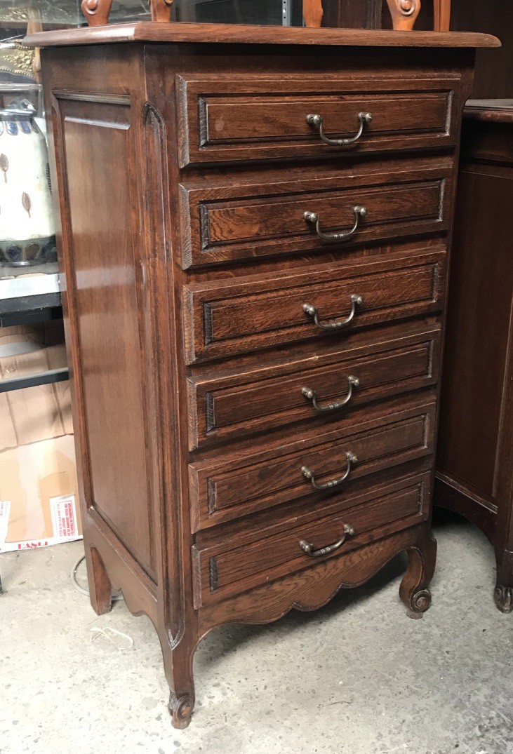 French provincial oak 6 drawer chest with iron handles.