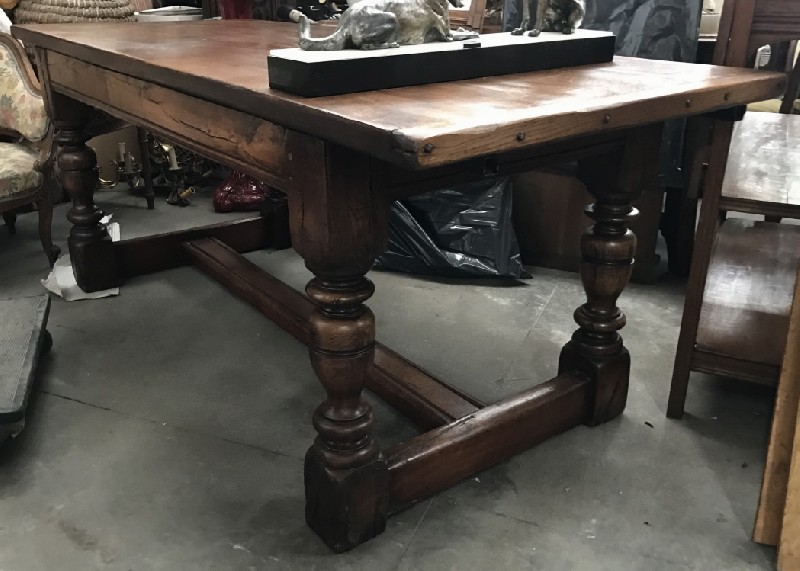 French provincial oak stretcher based refectory table, with plank top with bread board ends.