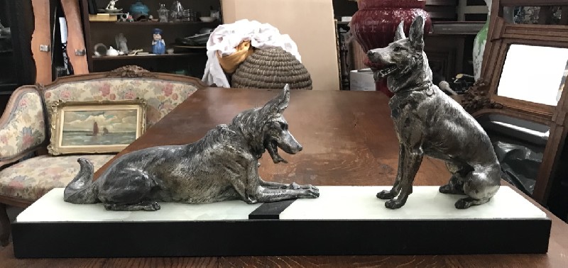 Art deco spelter statue of 2 dogs on marble base.
