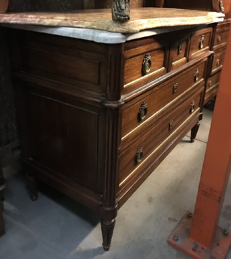 French early 20th century walnut & brass mounted three drawer commode with white marble top.
