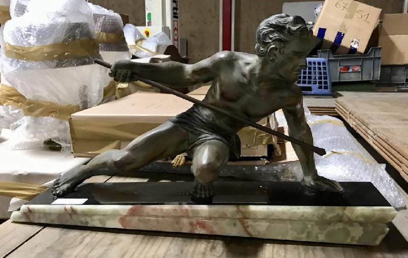 French art deco spelter statue of a male with spear on marble & green onyx base.