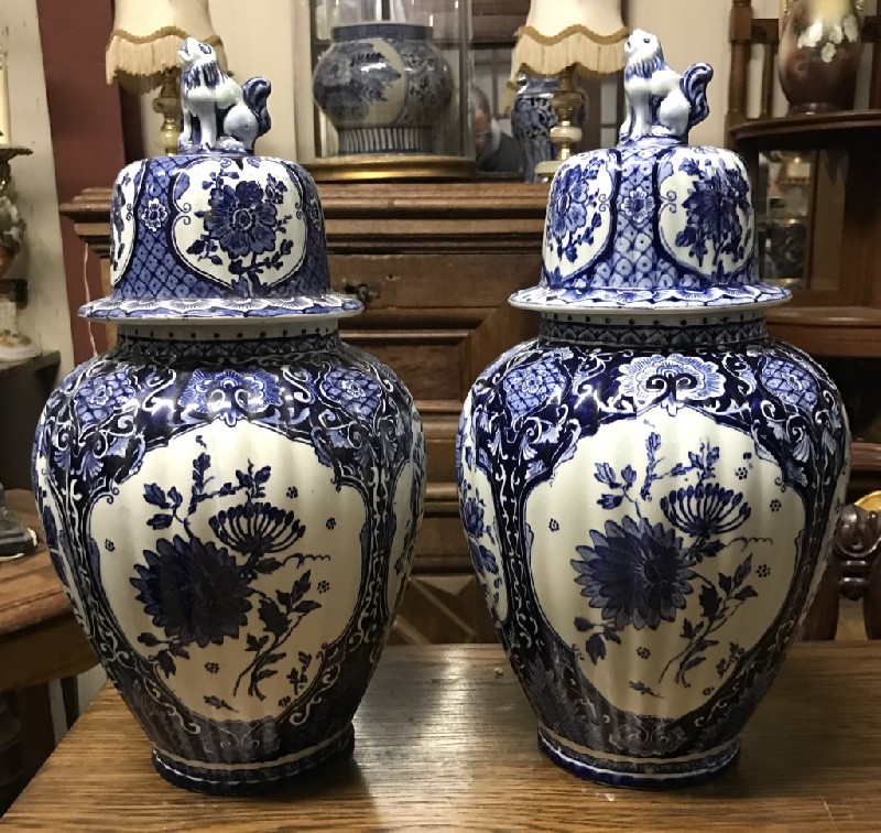 Pair of Delft blue & white floral porcelain covered vases 