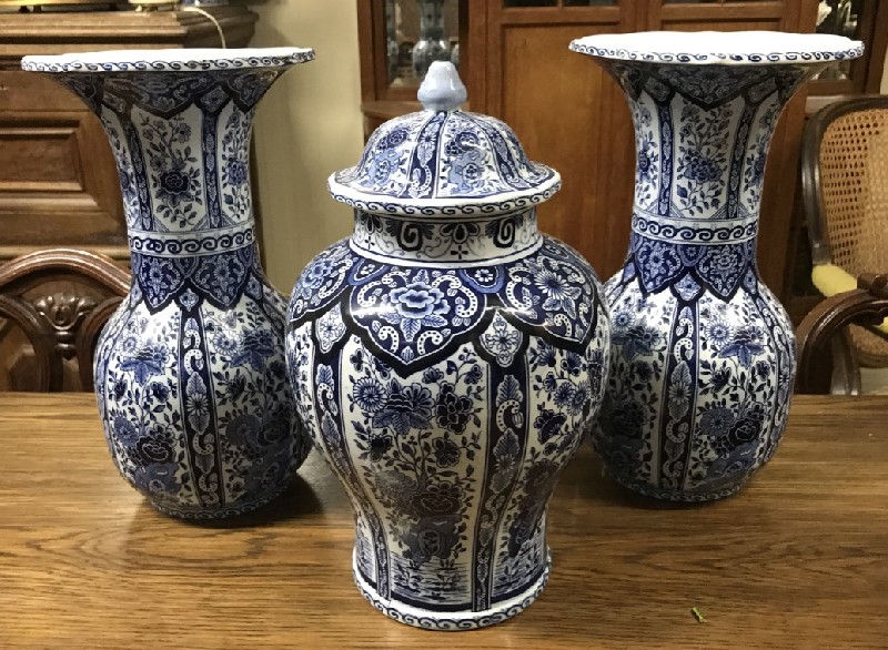 Set of 3 Delft blue & white floral porcelain covered vases.