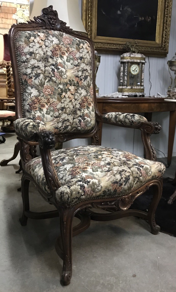 Large French Louis XVth carved oak & floral upholstered fauteuil.