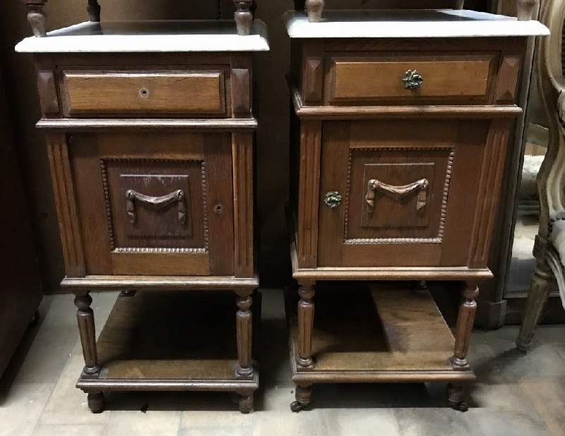 Pair of French oak & floral carved bedside cabinets with white marble tops.