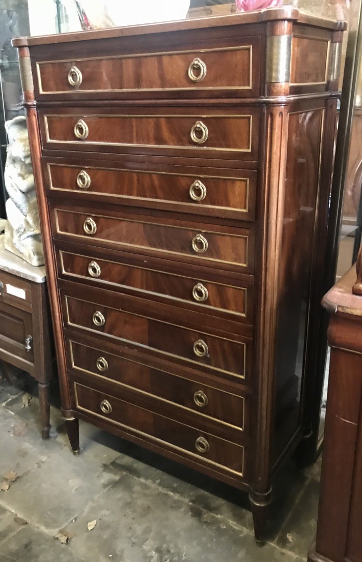 French mid century mahogany and brass mounted seven drawer semainier.