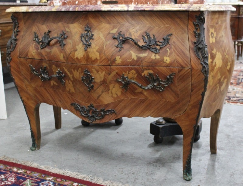 Fine French early 20th century Louis XVth walnut and floral marquetry inlaid commode having marble top and ormolu mounts.