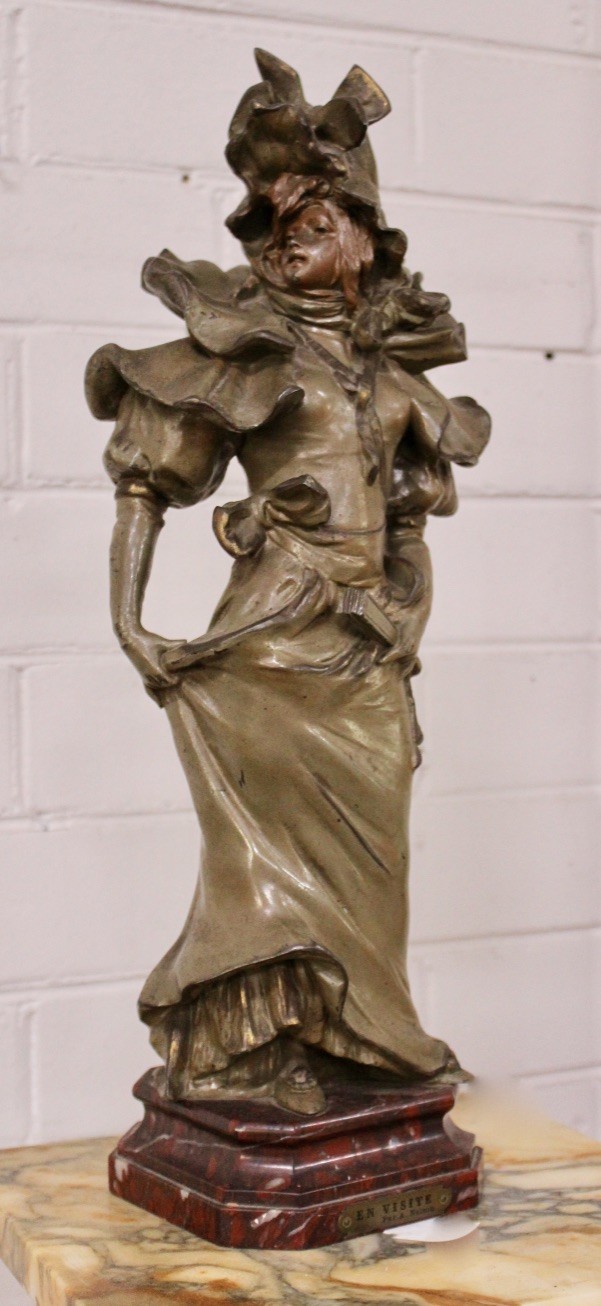 19th century French bronze maiden statue on rouge marble base.