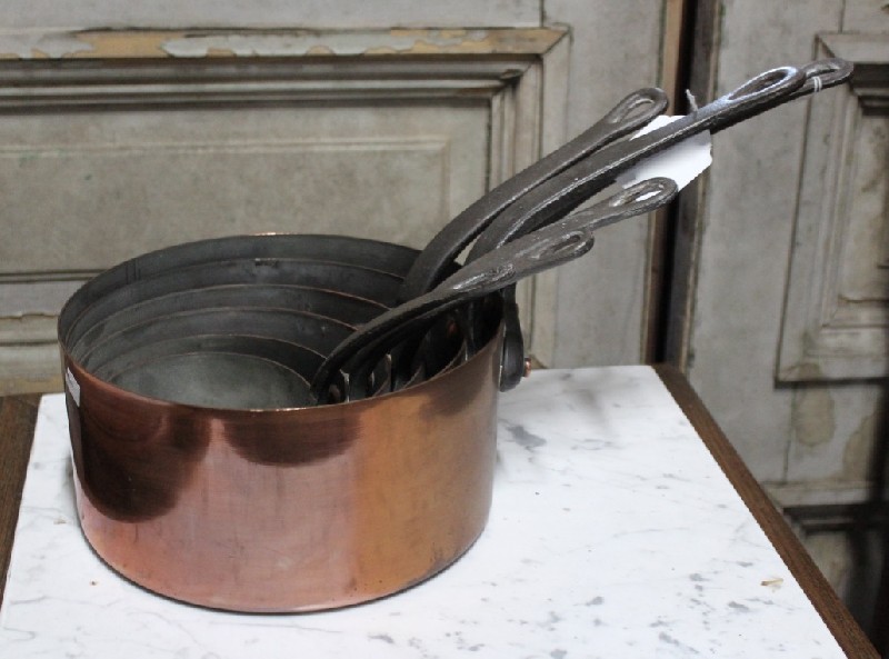 Set of 6 French antique copper saucepans.