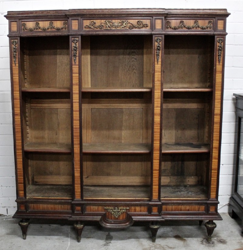 19th century French walnut and king wood ope front three section bookcase with cupid bronze mount to the central top section and fine  floral mounts. 