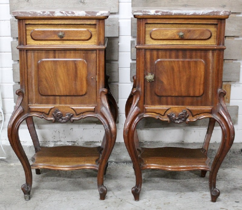 Pair of 19th century French mahogany bedside cabinets with rouge marble tops.