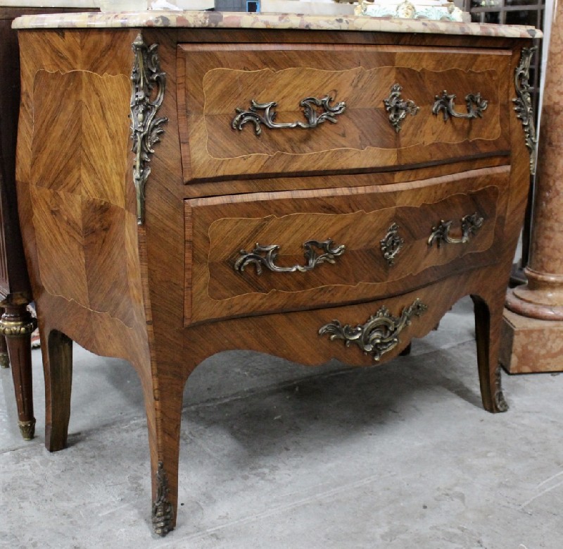 French Louis XVth king wood and inlaid commode with sienna marble top and ormolu mounts.