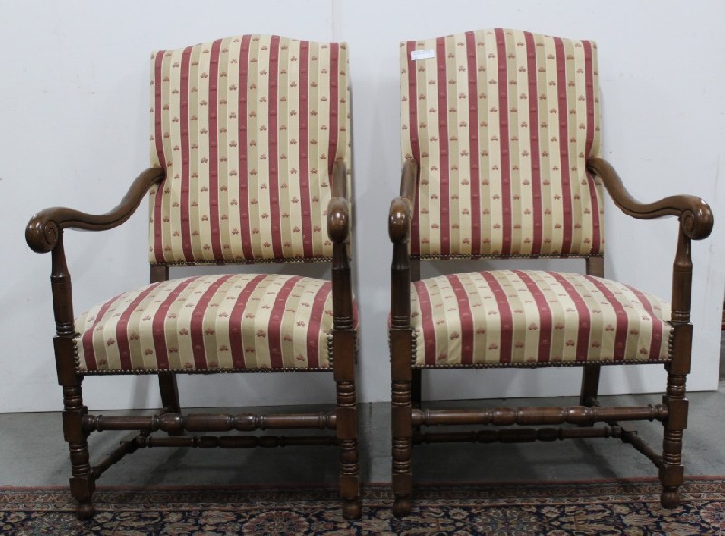 Pair of French walnut fauteuils with red and white stripped upholstery.