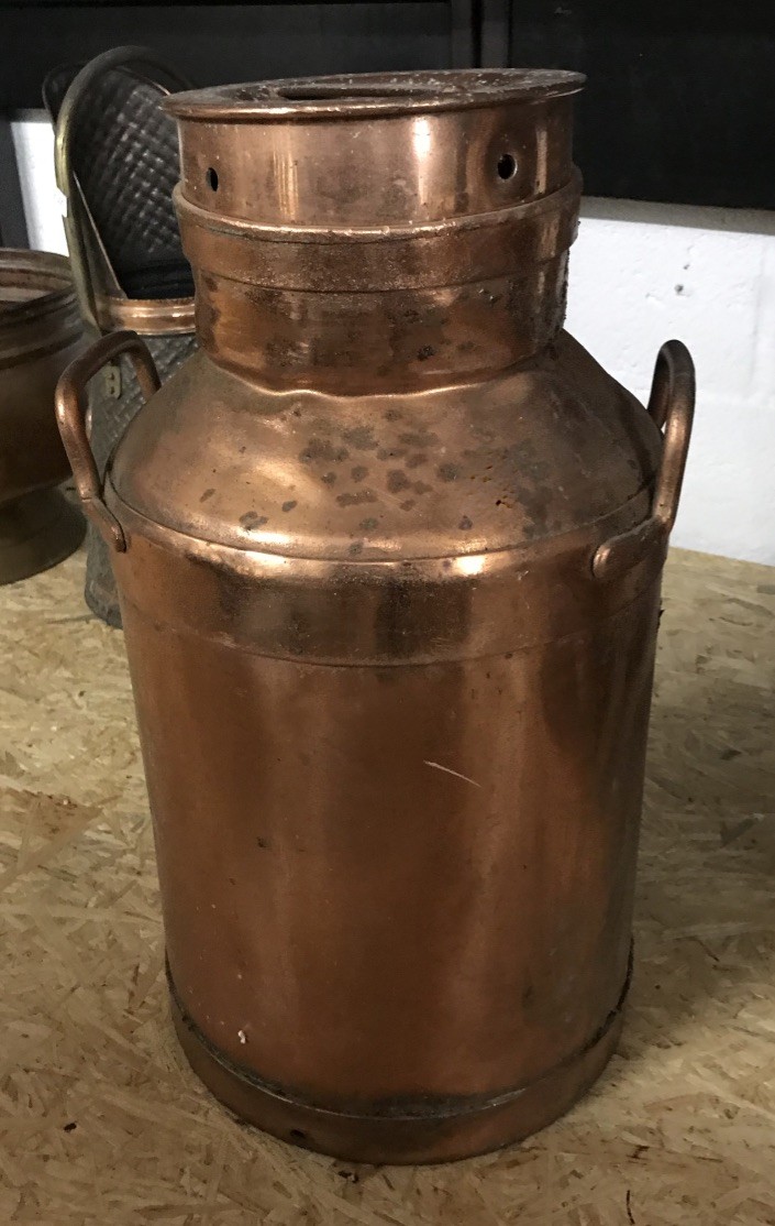 Antique copper milk container.