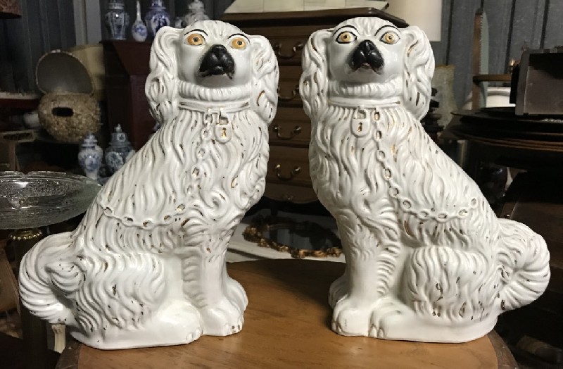 Pair of English Staffordshire pottery dog figures.