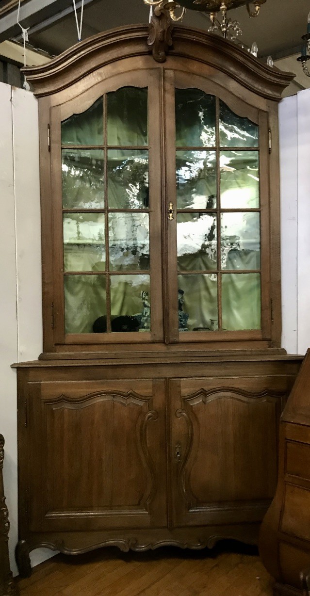 Interesting early 19th century French oak corner cabinet with two doors.