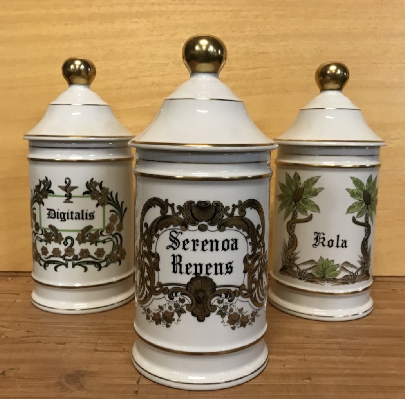 Set of six Limoges porcelain covered pharmacist jars.