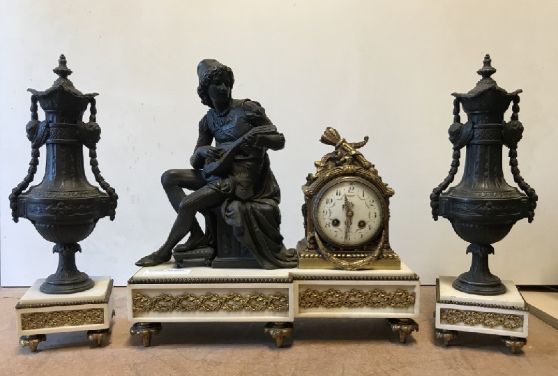 Three piece French 19th century white marble and bronze mounted clock set.