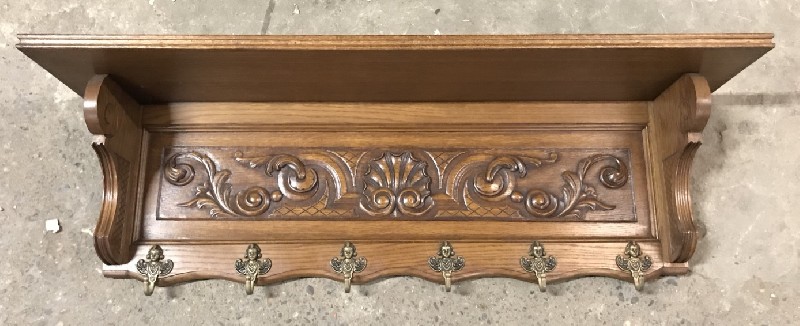 French carved oak coat rack with bronze hooks.