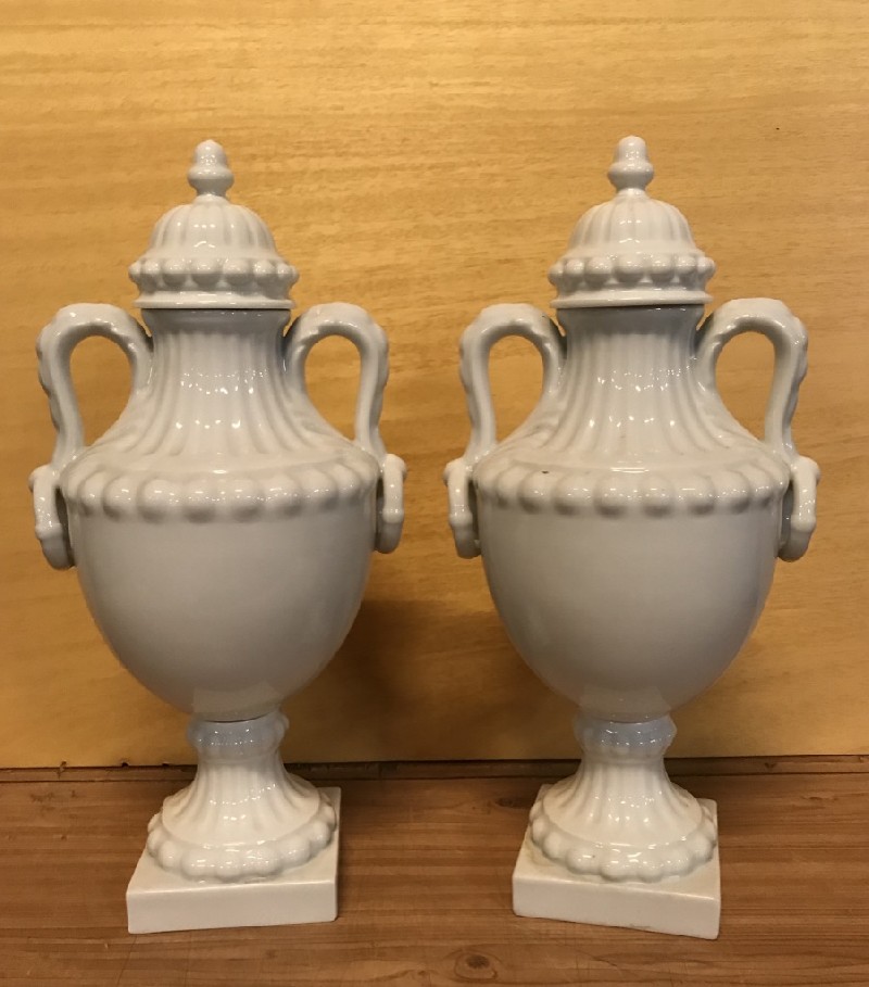 Pair of Limoges white porcelain covered vases.