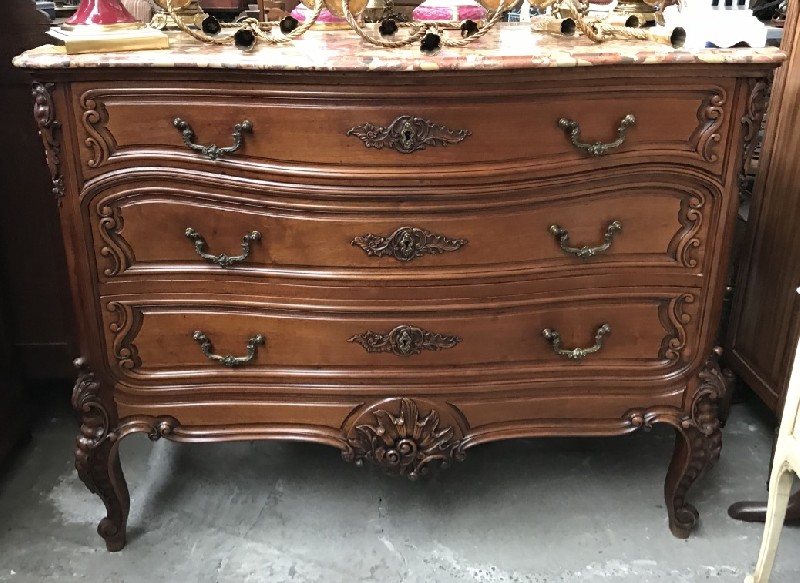 Fine 19th century French walnut three drawer commode with ornate marble top & bronze handles.