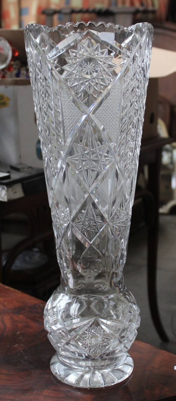 Tall and heavy diamond cut crystal vase. Price $380