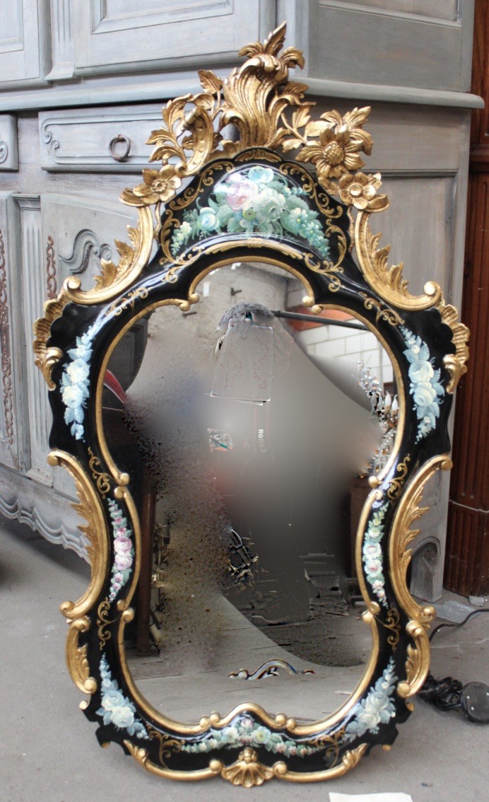Decorative Italian black lacquered, floral & gilt console mirror. Price $675