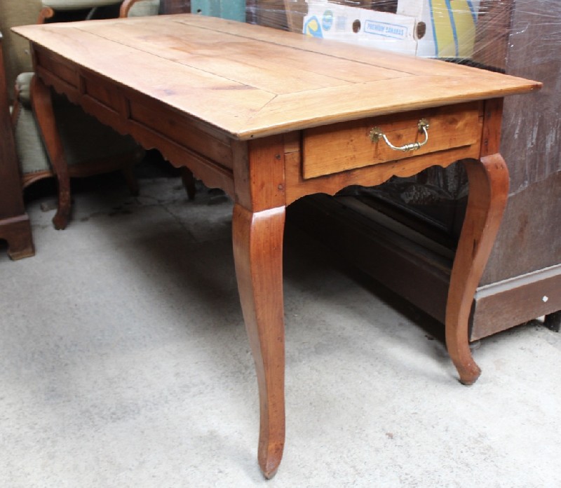19th century French cherry wood farm house table, having decorative skirt and drawer to the end. Length 1.8m. Price $1850