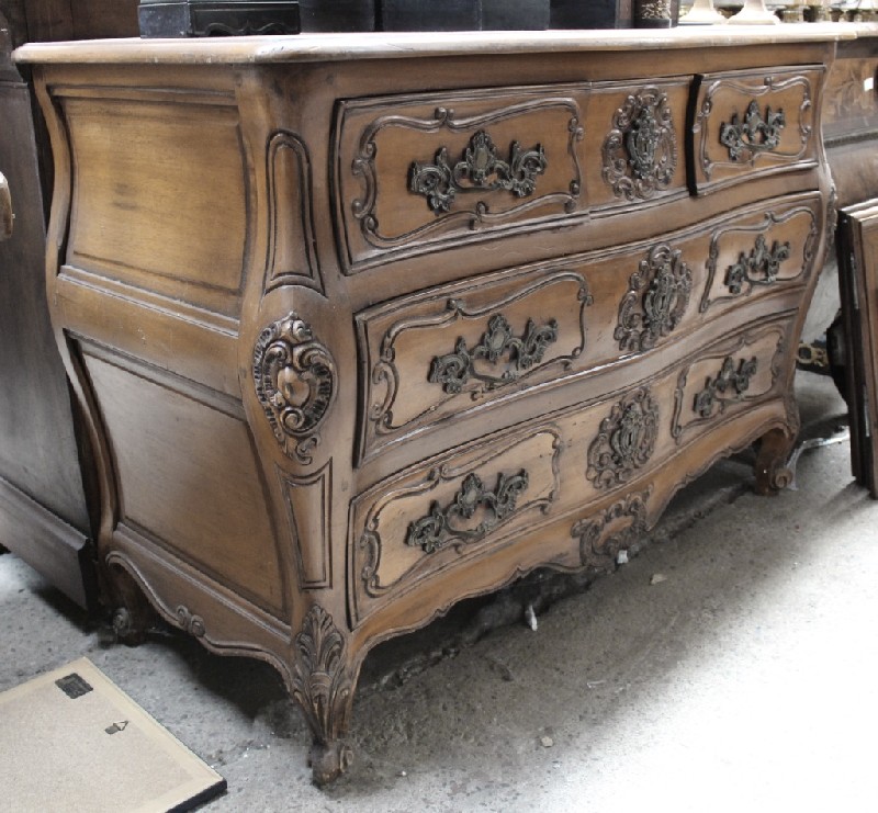 French provincial oak & floral carved three drawer commode, having bronze handles. Price $1450