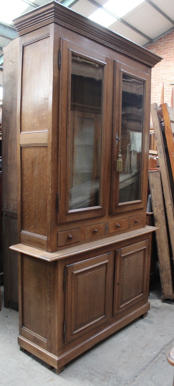 19th century French oak two door bookcase, the top section having 3 drawers across the middle. Price $2200