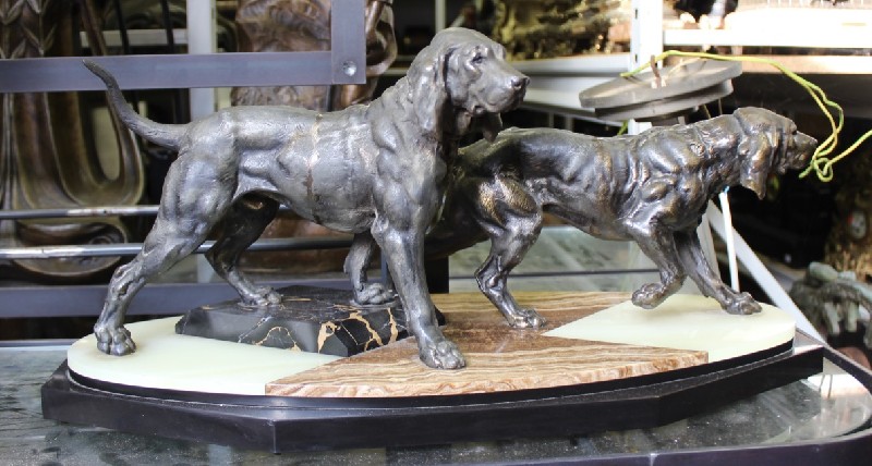 Art deco spelter figured statue of 2 dogs on multi coloured marble base. Price $925