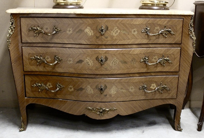 French Louis XVth walnut and floral inlaid three drawer commode, having marble top and bronze mounts. Price $1650.