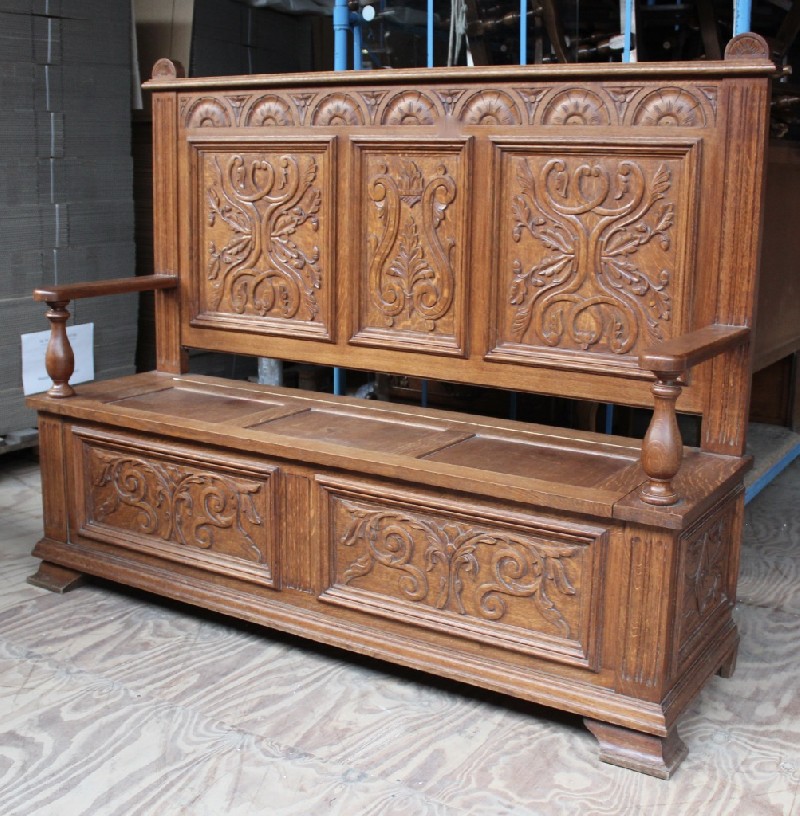 Good quality French 19th century carved oak hall way bench with lift up lid. Price $1800.